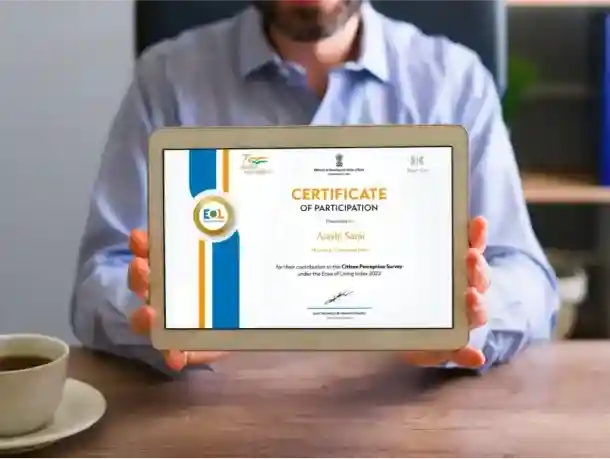 a man holding up a tablet with a certificate on it.