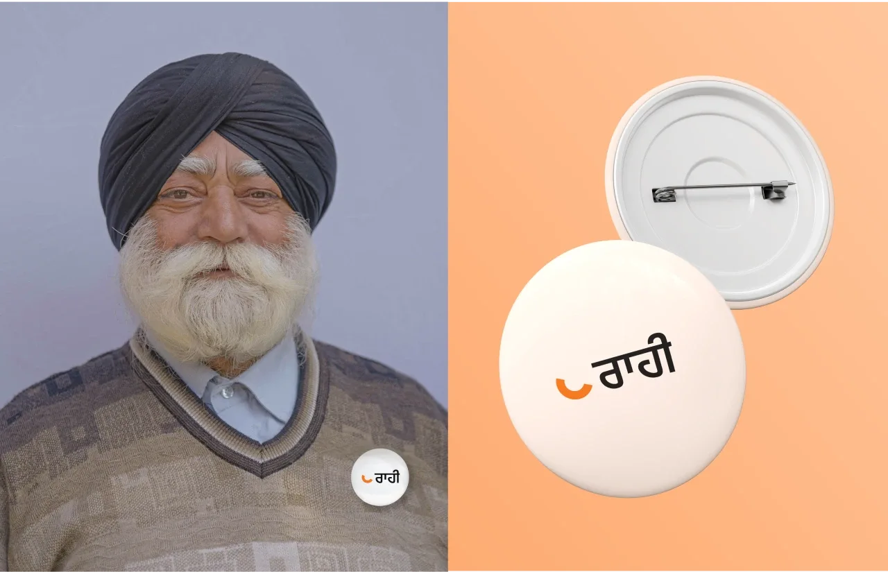 a man with a turban and a button.