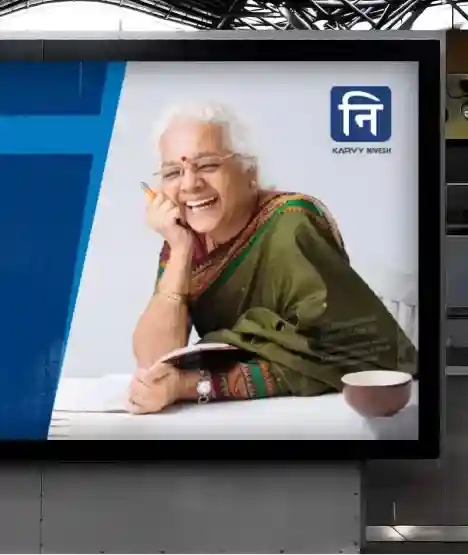 a billboard with an image of an old woman on it.